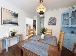 Enjoy a home-cooked meal or gather for a game night around the dining table
